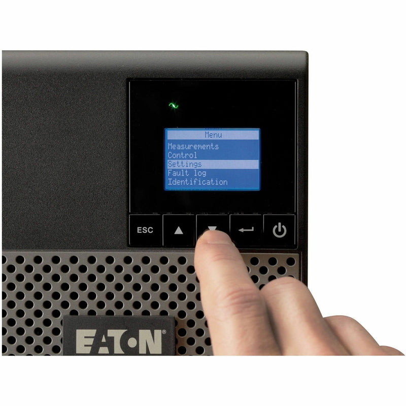 Close-up of Eaton 5P UPS LCD screen showing menu interface with finger operation