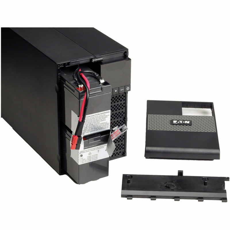 Open battery compartment of Eaton 5P UPS showing hot-swappable battery installation