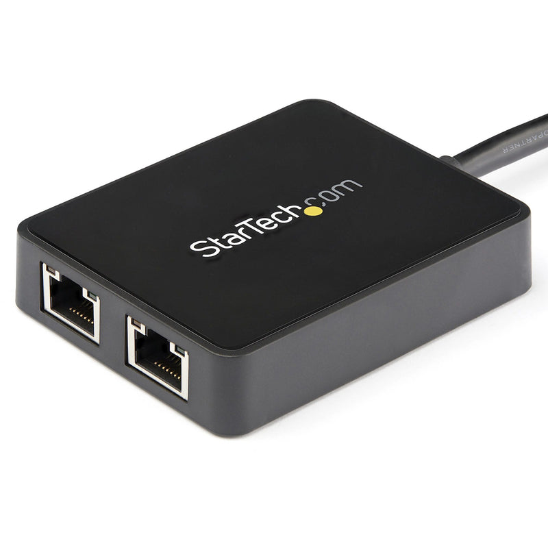 Angled perspective of StarTech.com dual Gigabit Ethernet adapter highlighting port accessibility