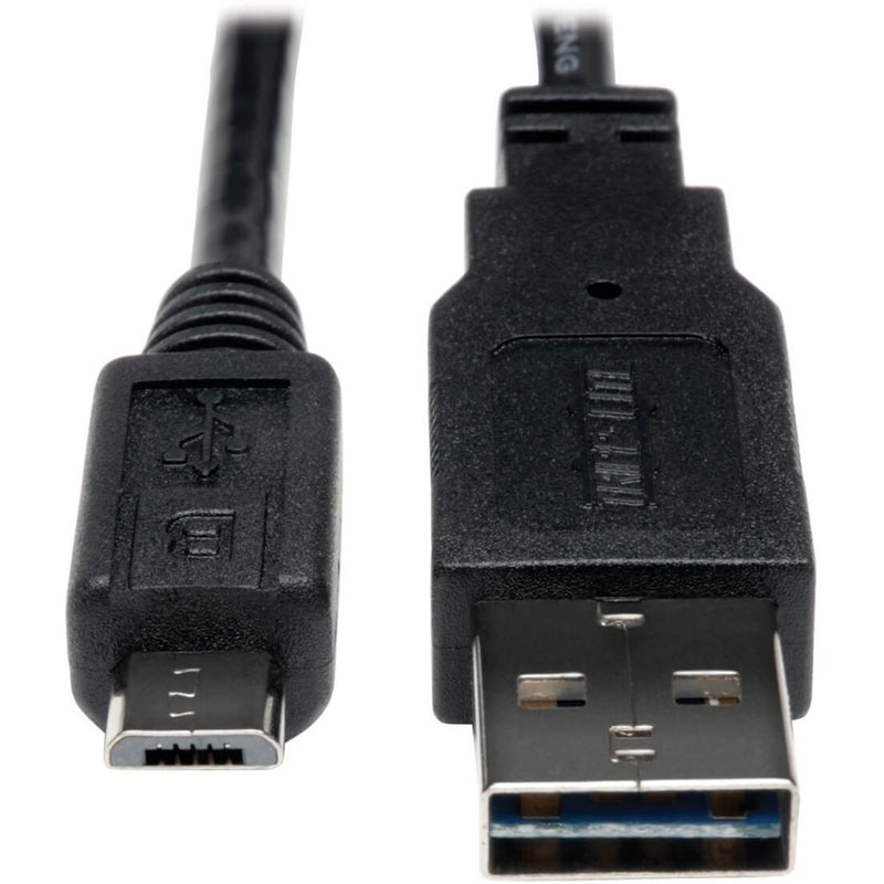 Close-up view of Tripp Lite UR050-003 USB cable showing reversible USB-A and micro-USB connectors