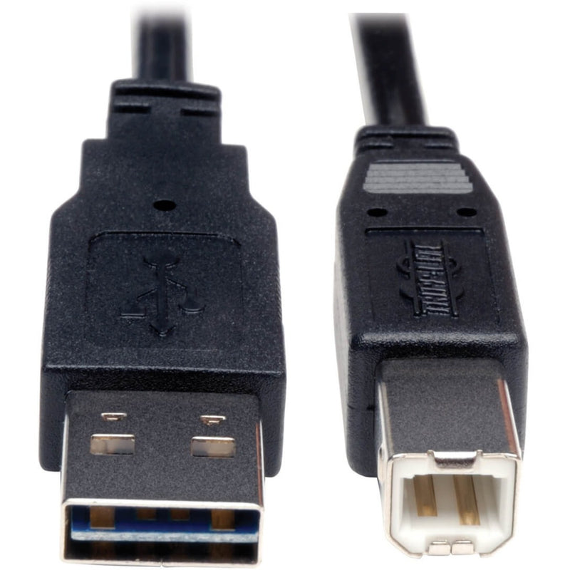 Close-up view of Tripp Lite USB cable connectors showing reversible Type-A and Type-B ends with gold-plated contacts