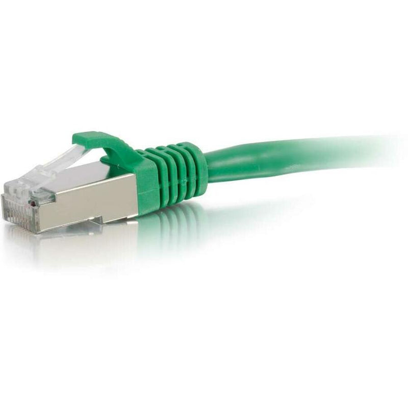 Close-up view of green Cat6 ethernet cable's RJ-45 connector showing gold-plated contacts and snagless boot