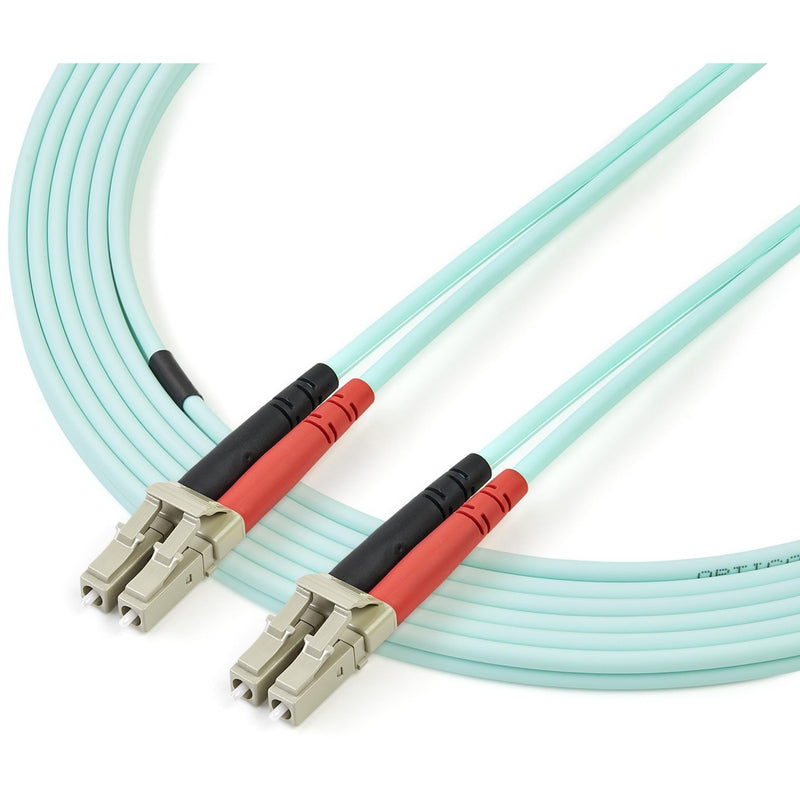 StarTech.com fiber optic cable showing full length with curved routing demonstration and both connector ends