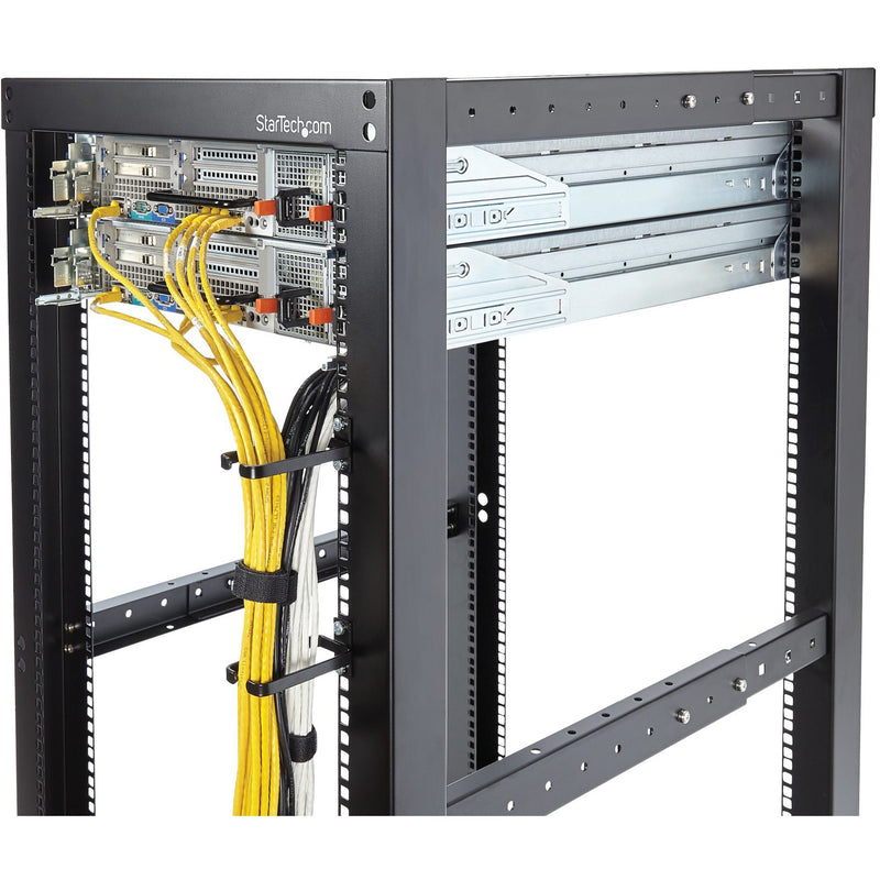 Server rack installation showing cable management with yellow network cables