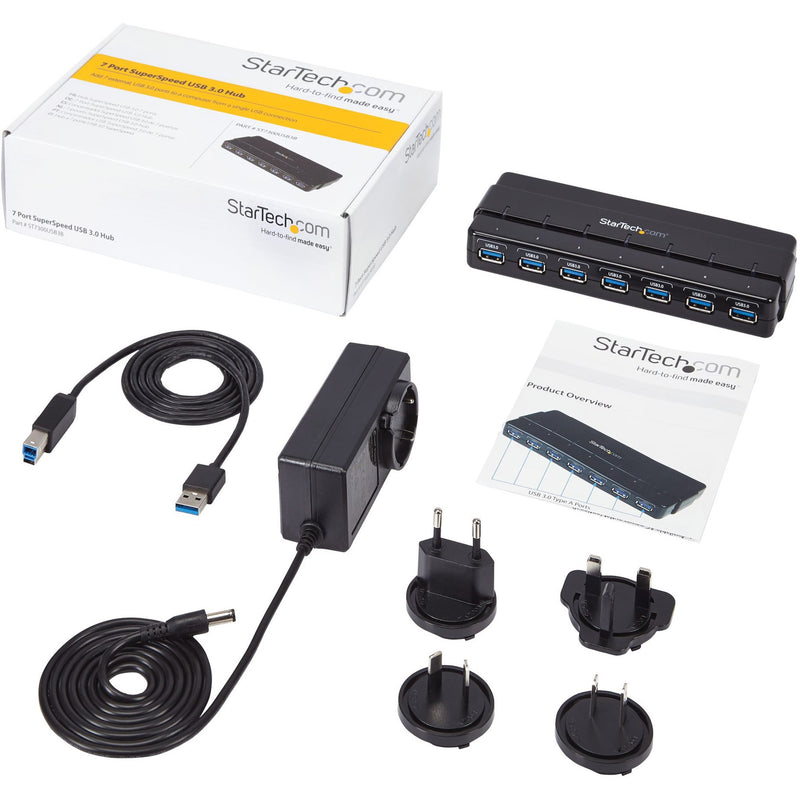 Complete package contents of StarTech USB hub including accessories and power adapters