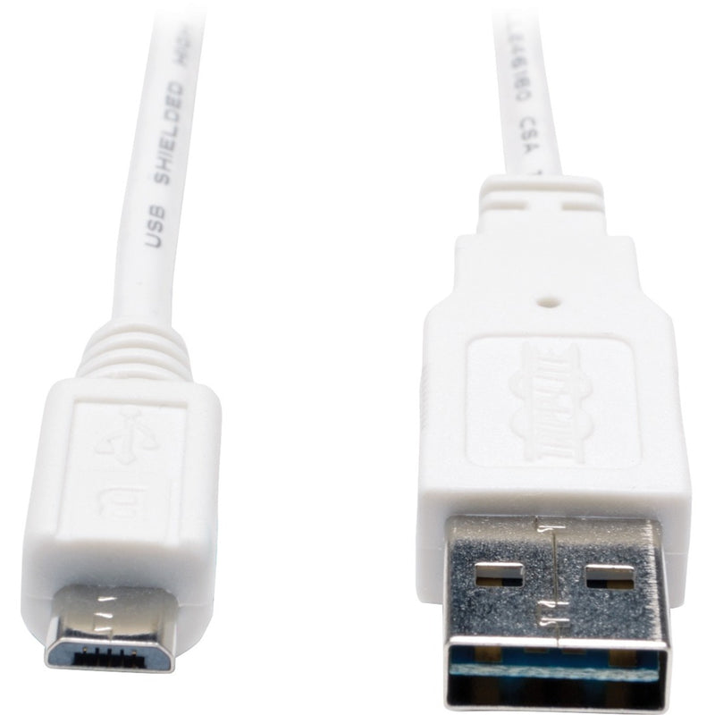 Close-up view of Tripp Lite white USB cable showing reversible Type-A connector and Micro-USB connector ends