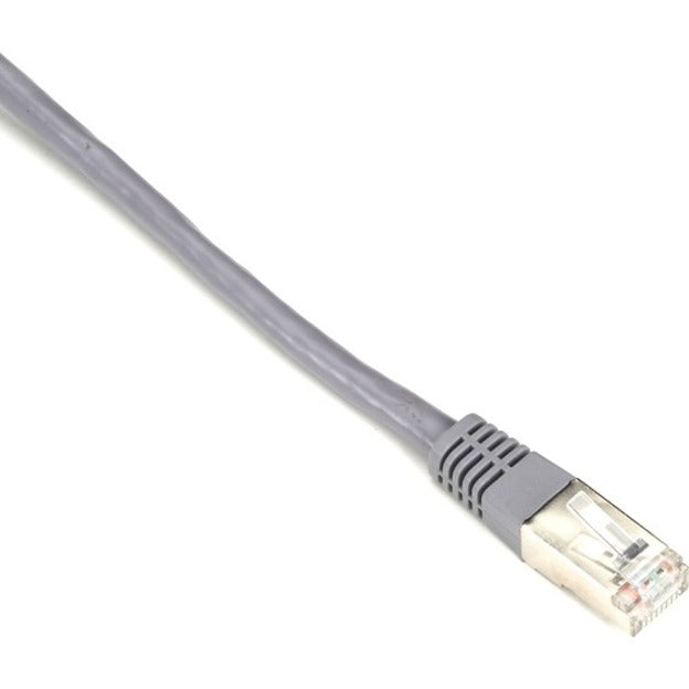 Close-up view of SlimLine Cat.5e cable's gray RJ-45 connector with strain relief boot and gold-plated contacts