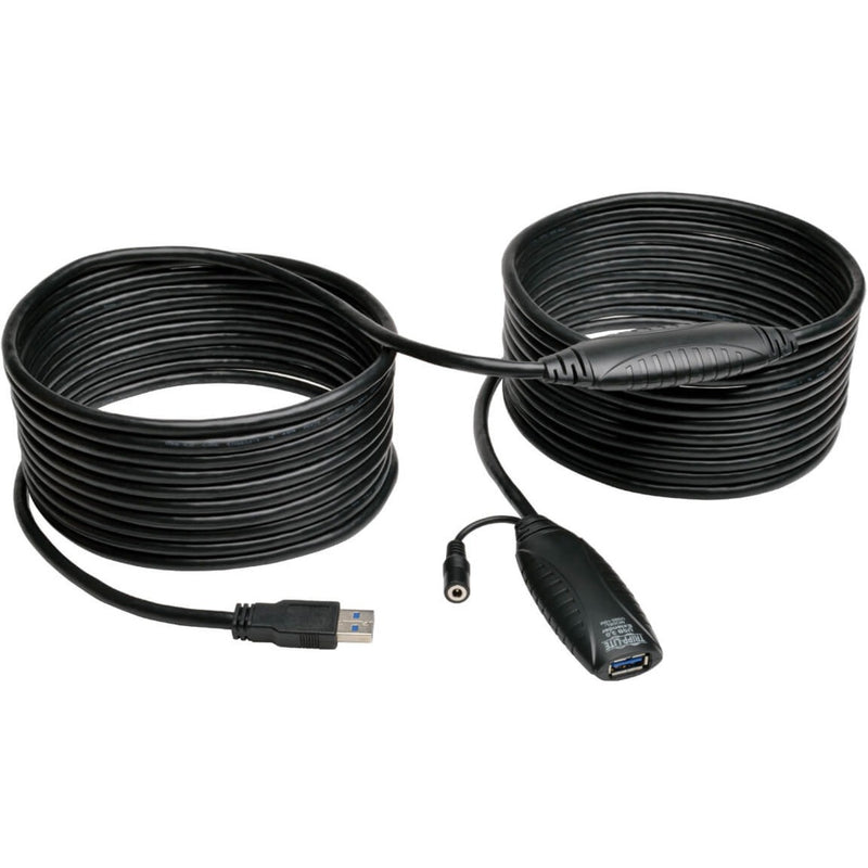 Tripp Lite U330-10M USB 3.0 active extension cable coiled showing full length with male and female connectors