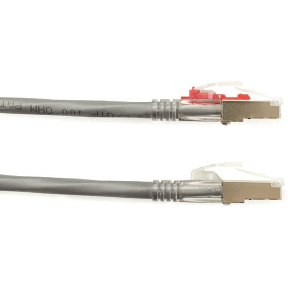 Detailed view of GigaTrue 3 cable construction showing jacket marking and connector assembly