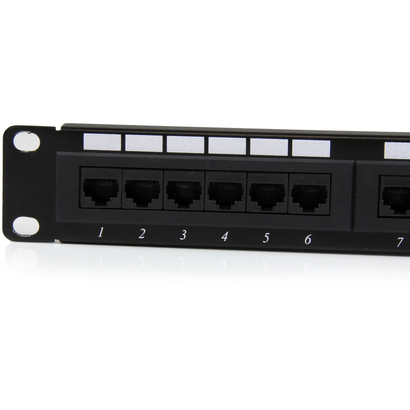 Close-up view of numbered RJ45 ports on StarTech.com Cat6 patch panel showing clear port labeling