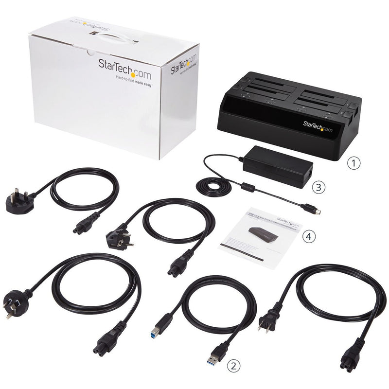 Complete package contents including dock, power adapters, cables, and documentation