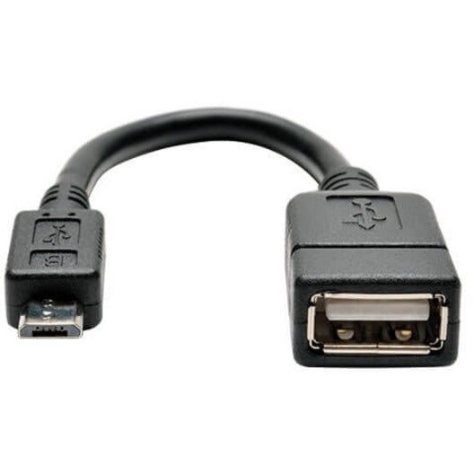 Angled view of Tripp Lite USB OTG adapter showing curved profile and both connector ends