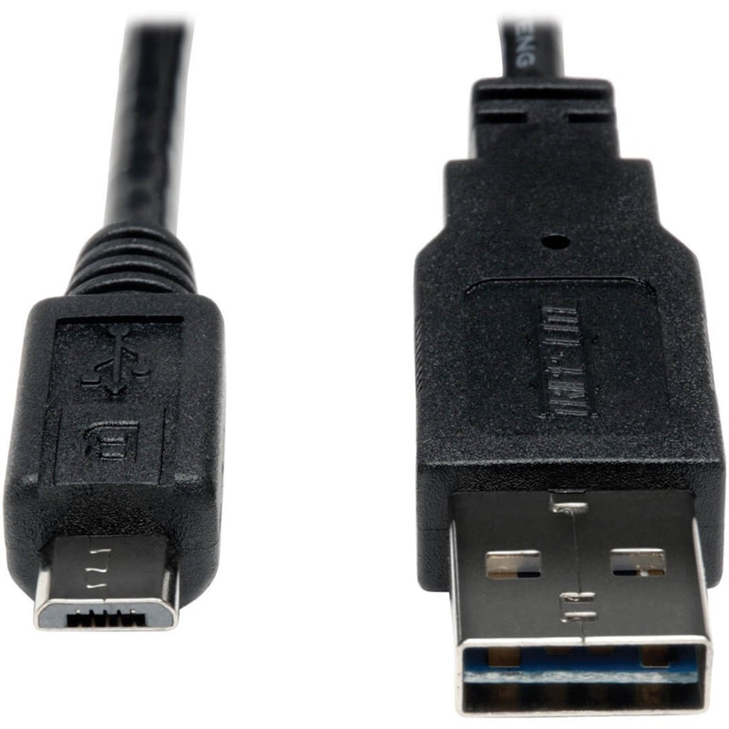 Close-up view of Tripp Lite USB cable connectors showing reversible Type-A and Micro-B ends with premium shielding