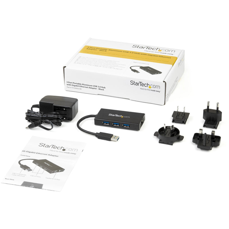 Complete package contents of StarTech.com USB hub including power adapters and manual