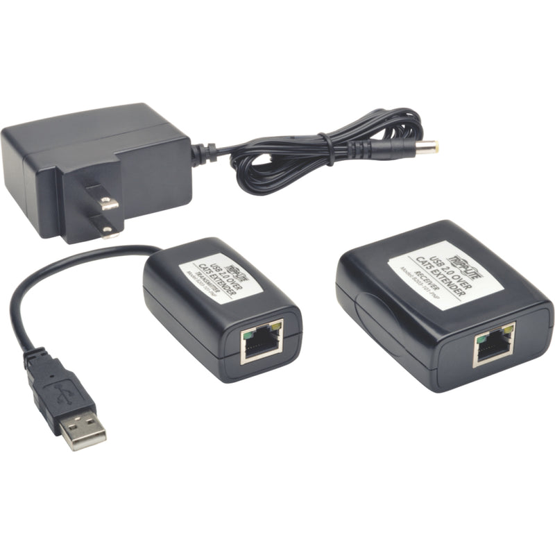 Complete Tripp Lite USB extender kit with transmitter, receiver, and power supply unit displayed