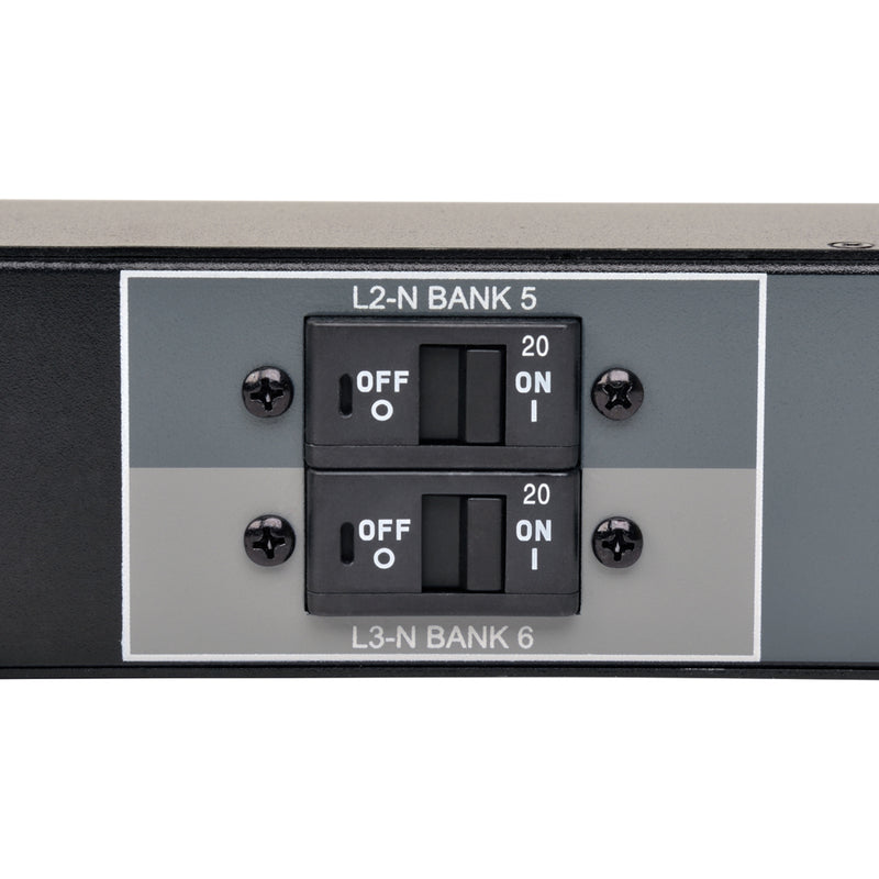 Close-up of PDU circuit breaker panel showing dual breaker configuration