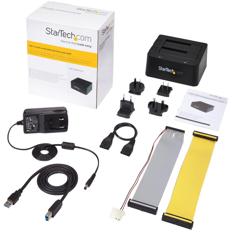 Complete package contents including docking station, cables, and power adapters