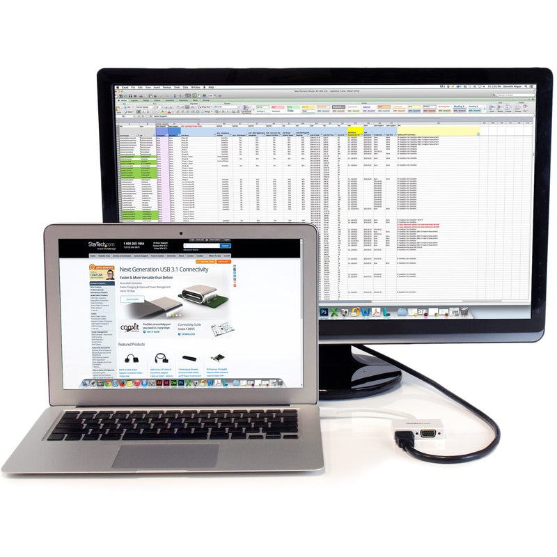 MacBook connected to external monitor using StarTech adapter in office setting
