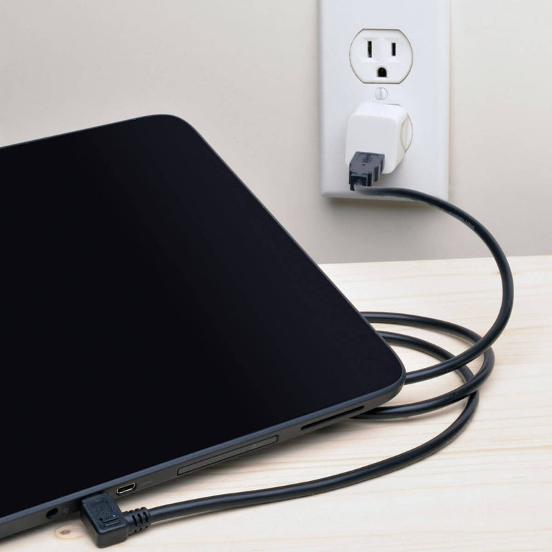 Tablet charging setup showing right-angle connector advantage in tight space