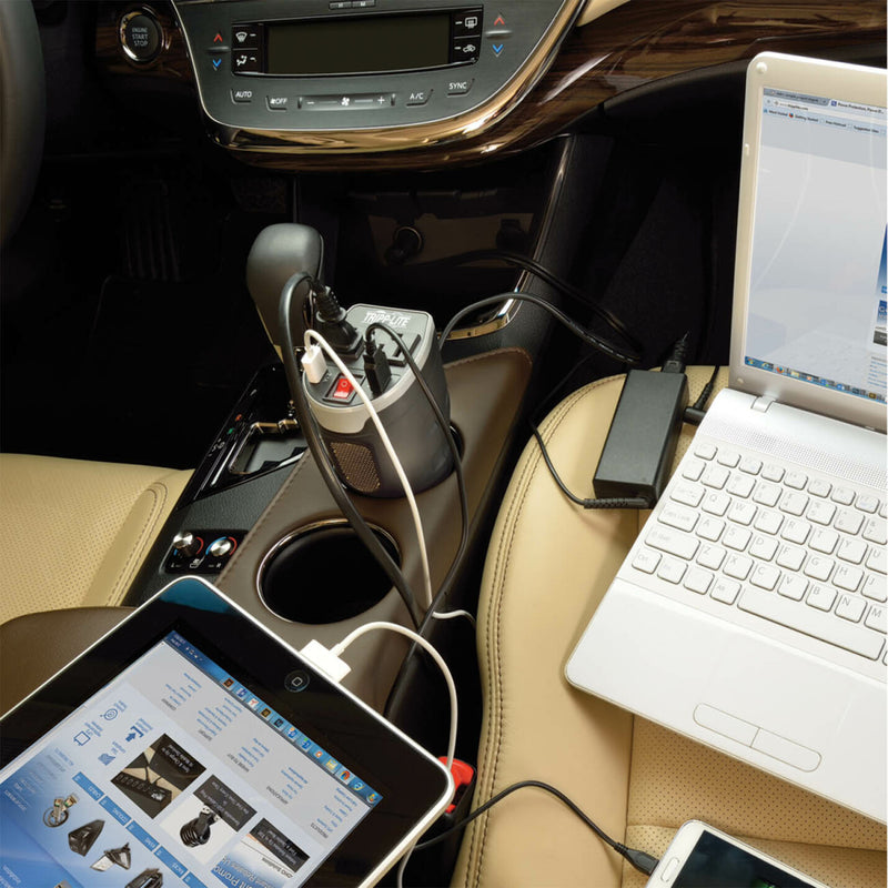 PV200CUSB inverter in car cup holder powering laptop and mobile devices