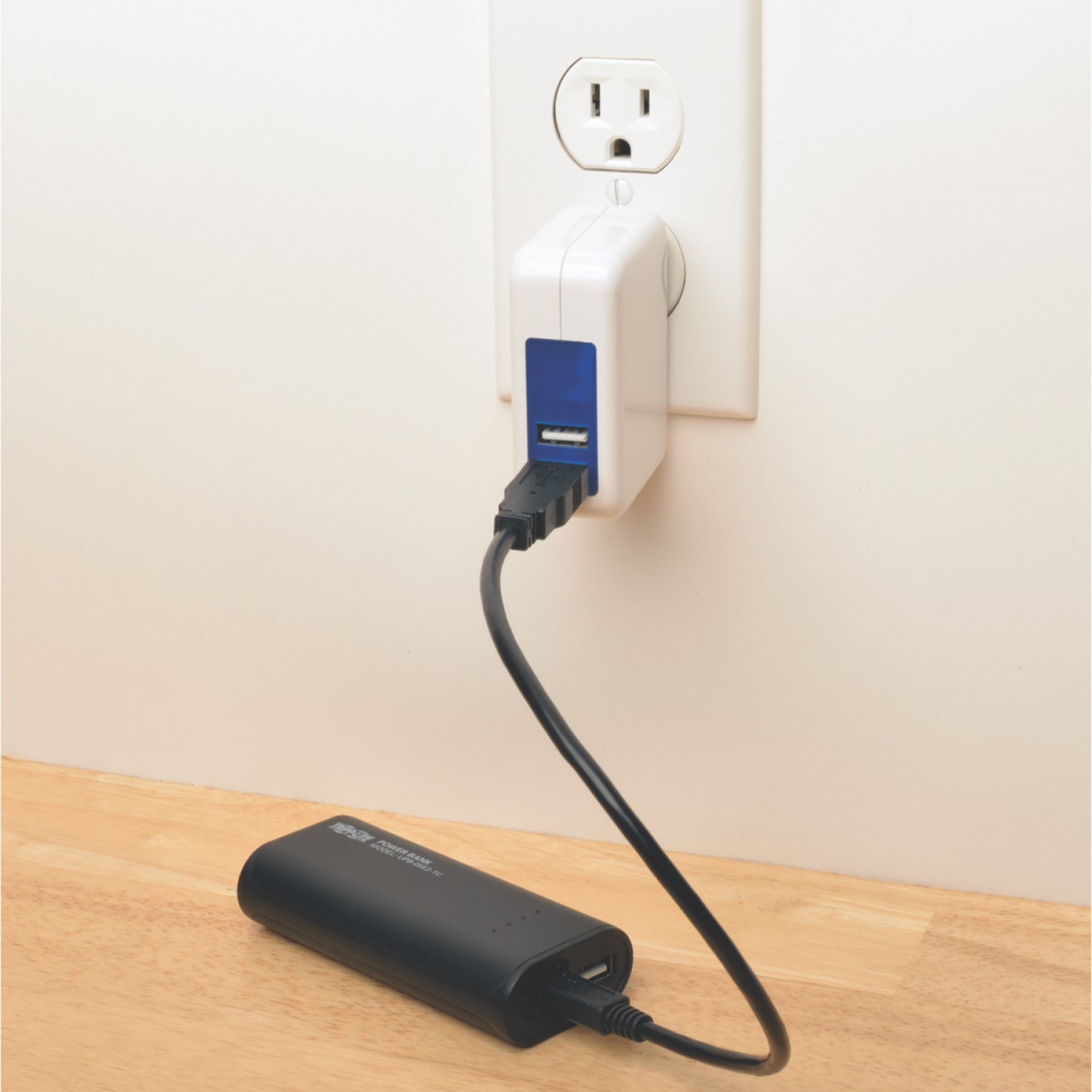 Tripp Lite power bank being charged via wall outlet USB adapter-alternate-image2