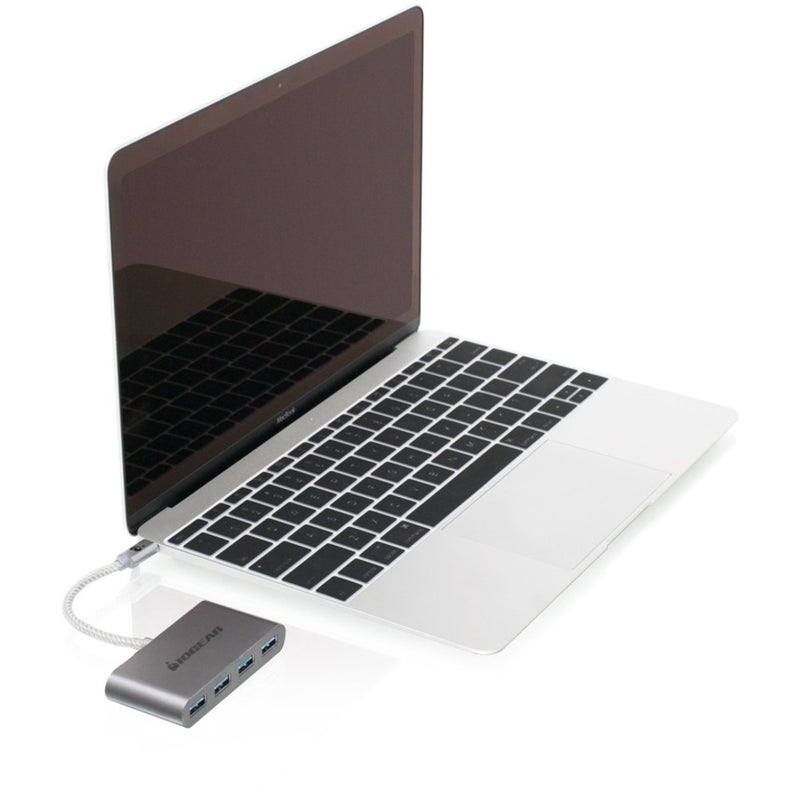 IOGEAR USB-C hub connected to a modern laptop showing real-world usage scenario