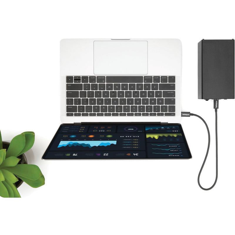 StarTech.com Thunderbolt 3 cable connecting laptop to external storage and peripherals