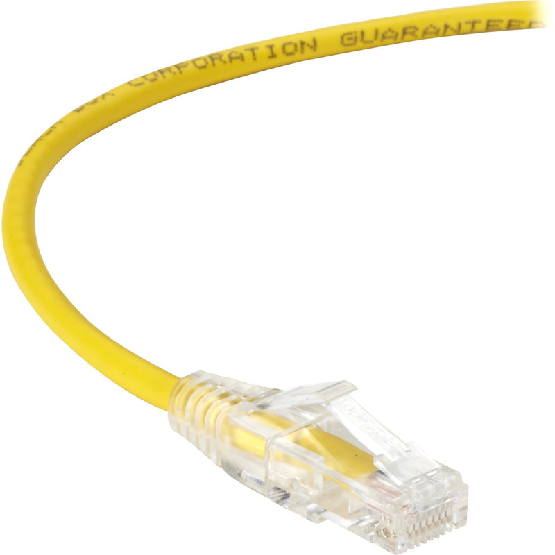 Close-up view of Yellow Cat.6 network cable with transparent RJ-45 connector showing gold-plated contacts