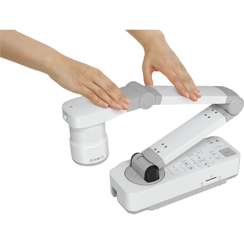 Hands demonstrating easy positioning of Epson DC-21