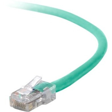 Close-up view of Belkin CAT6 green ethernet cable with transparent RJ45 connector showing gold-plated pins