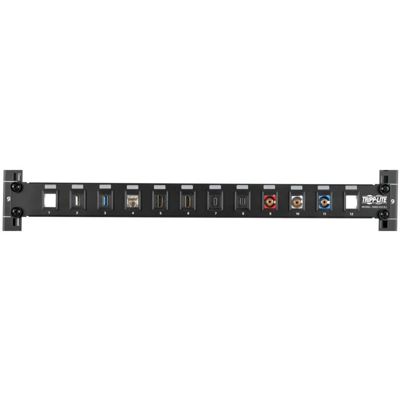 Patch panel populated with various types of keystone jacks including USB, HDMI, and audio connections