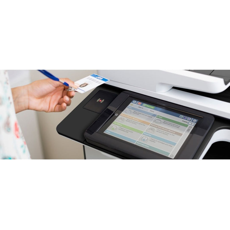 HP Universal USB Proximity Card Reader being used to authenticate a print job with an ID badge tap on a multifunction printer with touchscreen display