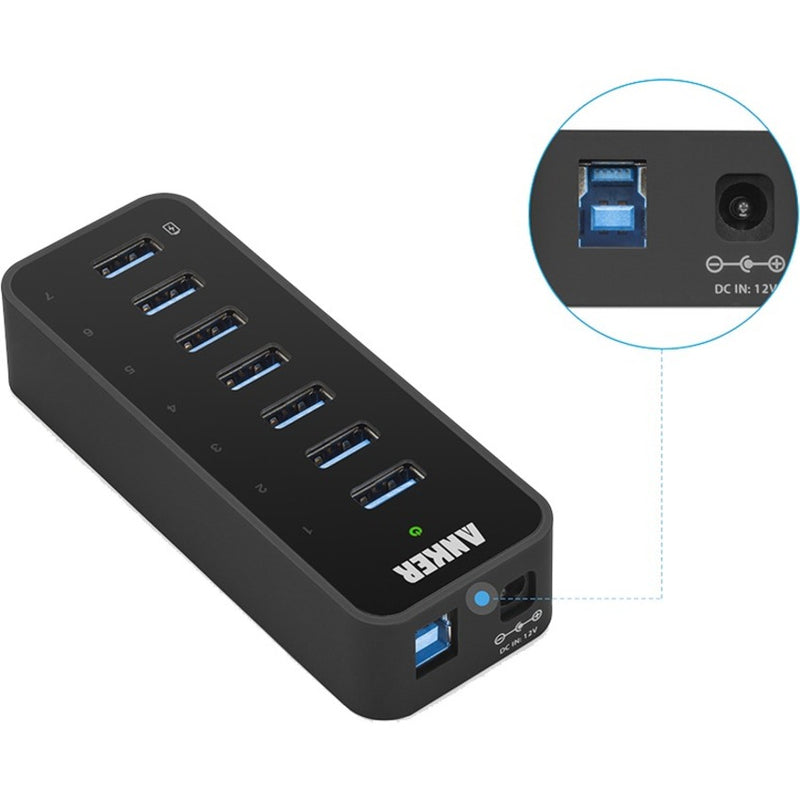 Close-up view of Anker USB hub's power input port and USB 3.0 connections