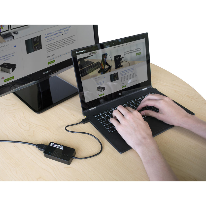 Demonstration of Plugable adapter connected to laptop with external monitor setup
