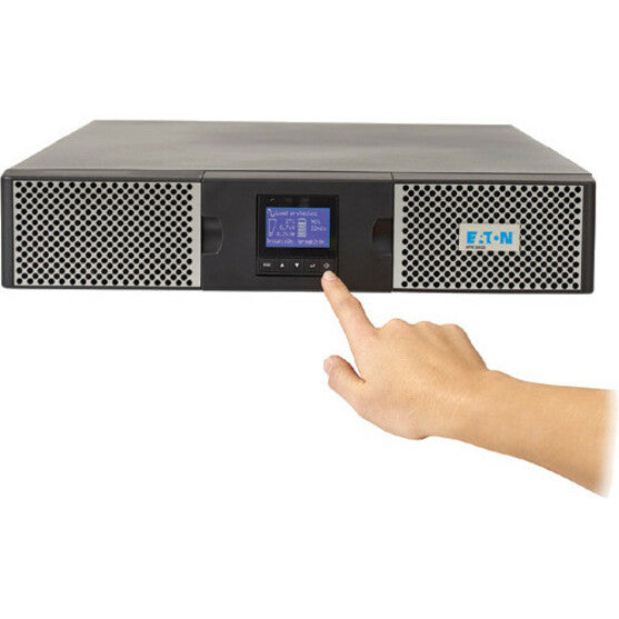 Hand pointing to Eaton 9PX UPS control panel interface