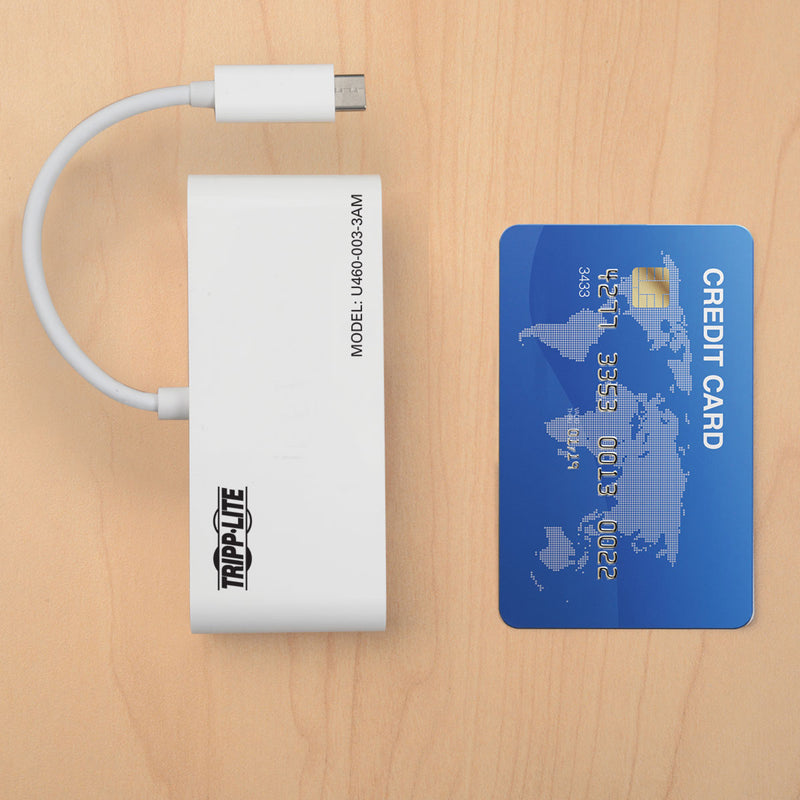 USB hub shown next to credit card for size comparison