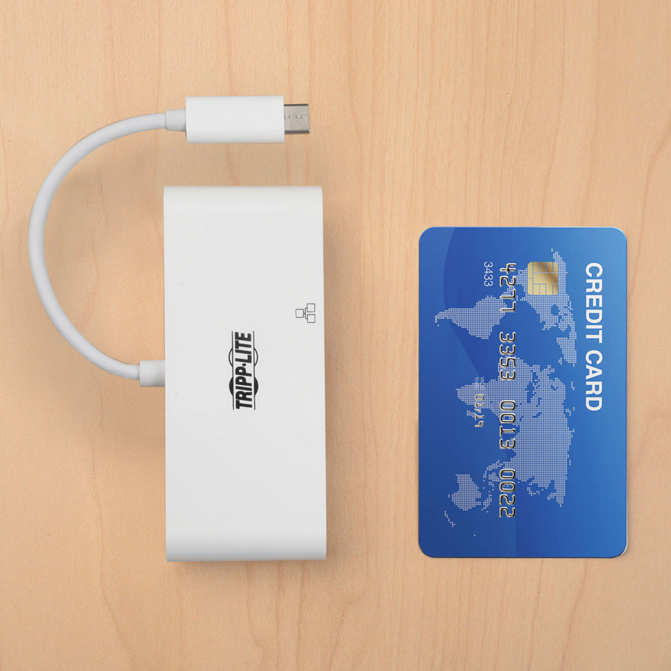 Size comparison of Tripp Lite docking station next to a credit card-alternate-image7