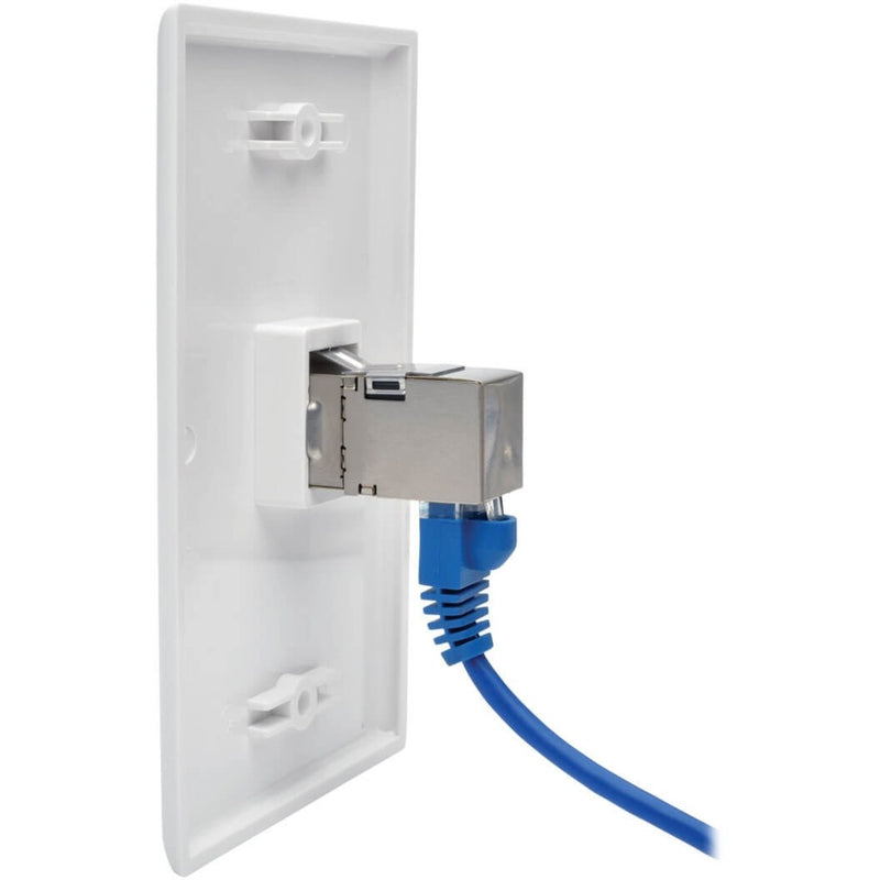 Wall plate installation showing 90-degree angled network adapter with connected cable