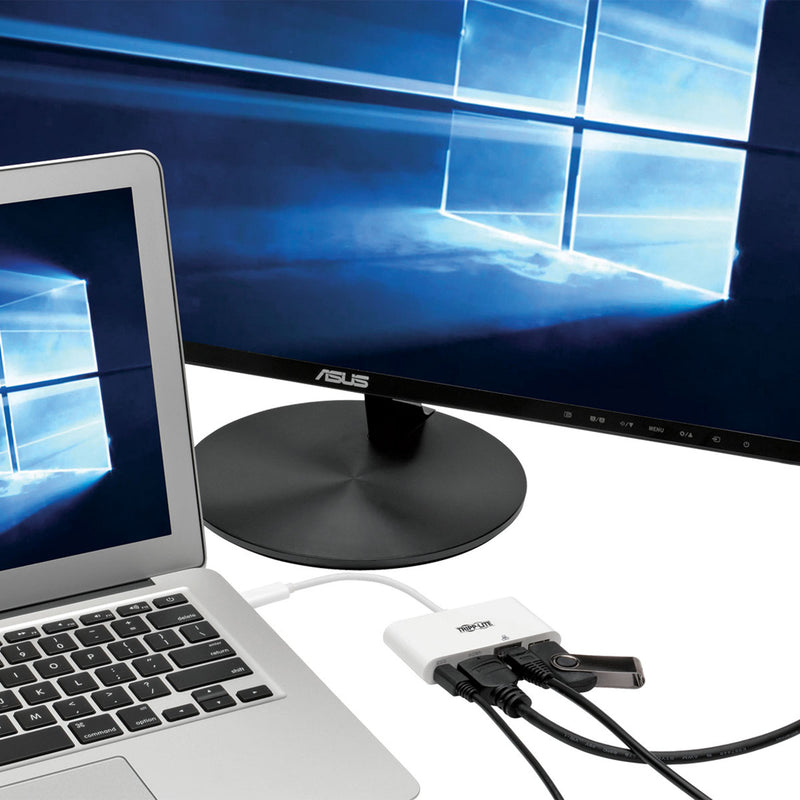 Laptop connected to external monitor via Tripp Lite docking station showing Windows desktop