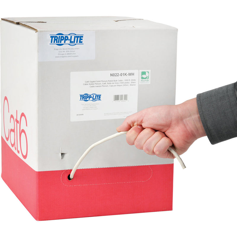 Hand pulling white Cat6 cable from Tripp Lite pull box dispenser