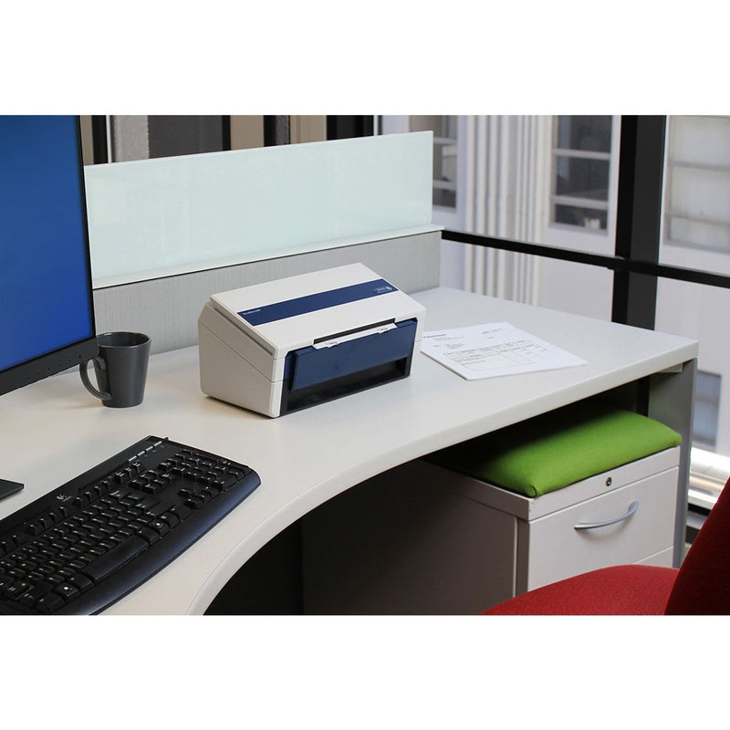 DocuMate 6440 scanner on office desk with keyboard and monitor