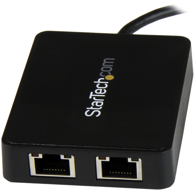 Angled view of StarTech.com dual Gigabit Ethernet adapter showing brand logo and port layout