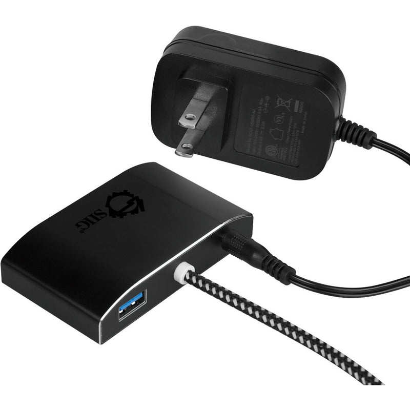 SIIG USB hub with power adapter connected showing power delivery capability