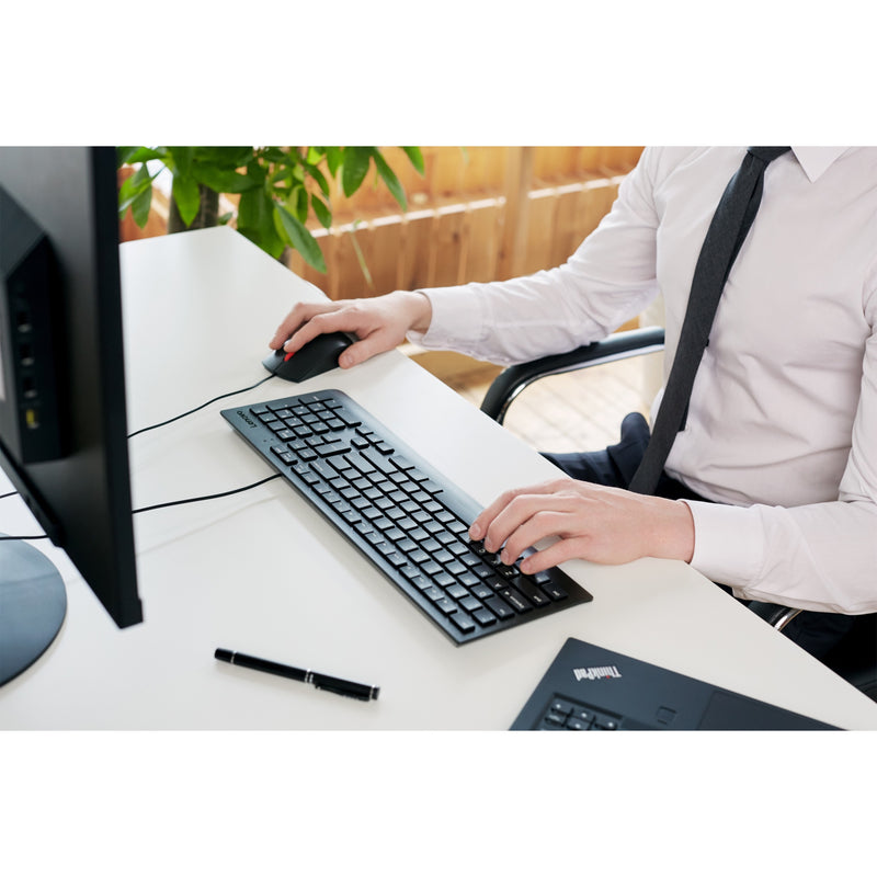 Lenovo Essential Keyboard and Mouse being used in a professional office setting