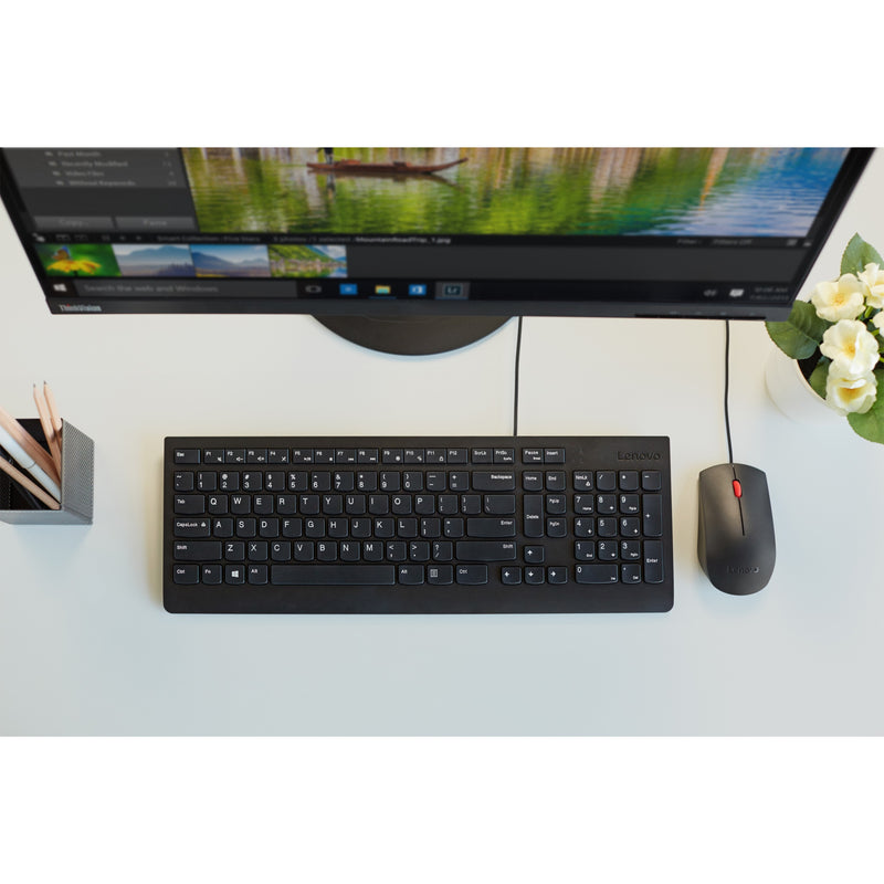 Top-down view of Lenovo Essential Keyboard and Mouse on a clean, organized desktop