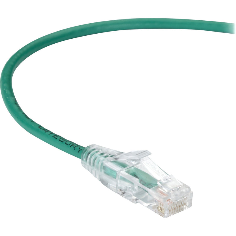 Close-up view of green Cat.6 network cable with transparent RJ-45 connector and snagless boot