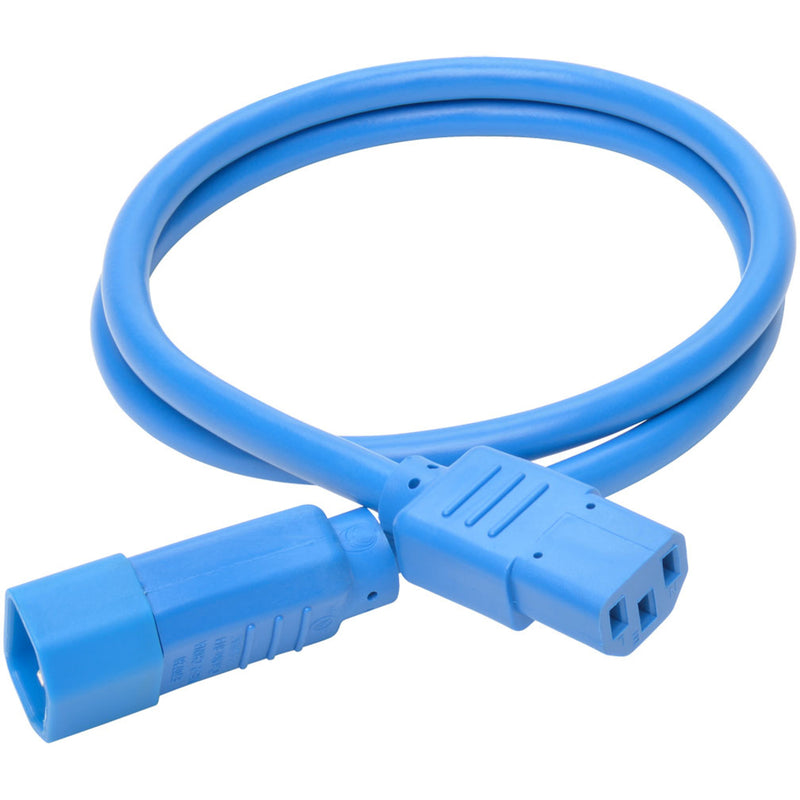 Full length view of coiled blue Tripp Lite power extension cord showing flexibility