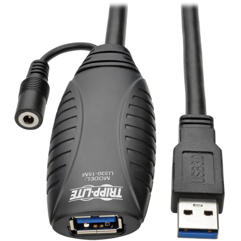 Close-up view of Tripp Lite USB 3.0 active extension cable showing signal booster unit and USB connectors