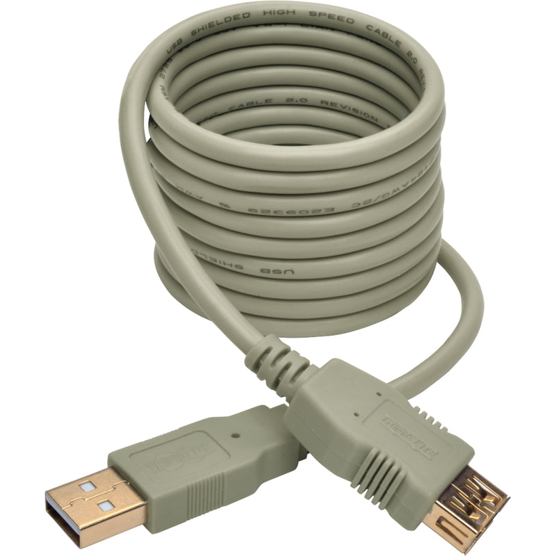 Coiled beige USB extension cable showing flexible design and strain relief features