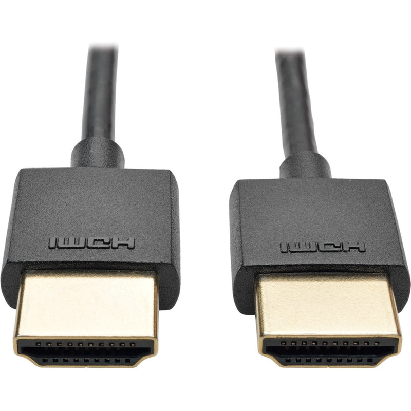 Close-up view of gold-plated HDMI connectors with Tripp Lite branding on slim black housing